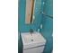 Stylish bathroom with blue tile and modern fixtures at 7219 Williams S Dr, St Petersburg, FL 33705