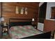 Inviting bedroom with wood accents, comfortable bed and natural light at 7219 Williams S Dr, St Petersburg, FL 33705