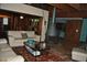 Comfortable living room area with a unique fireplace feature, plush seating, and stylish decor at 7219 Williams S Dr, St Petersburg, FL 33705