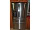 A large stainless steel refrigerator with a water dispenser and three lower drawers is featured at 7219 Williams S Dr, St Petersburg, FL 33705