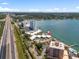 Aerial view of the waterfront condos, beach and the highway at 7310 Sunshine Skyway S Ln # 219, St Petersburg, FL 33711