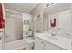 Cozy full bathroom with shower-tub combo and vanity at 7310 Sunshine Skyway S Ln # 219, St Petersburg, FL 33711