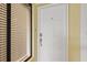Inviting front door of unit 219 with sidelight at 7310 Sunshine Skyway S Ln # 219, St Petersburg, FL 33711