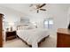Sunny bedroom with large bed and water views at 7310 Sunshine Skyway S Ln # 219, St Petersburg, FL 33711