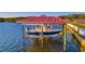 Waterfront home with a private boat lift and direct access to the open water at 8841 W Millpoint Rd, Riverview, FL 33578