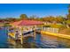 Well-maintained boat lift situated on the waterfront, perfect for boating and enjoying the water at 8841 W Millpoint Rd, Riverview, FL 33578