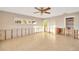 Living room with tile flooring and large windows for natural light at 8841 W Millpoint Rd, Riverview, FL 33578