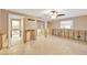 The room featuring neutral tones and tile floors at 8841 W Millpoint Rd, Riverview, FL 33578