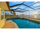 Screened-in pool and spa with lovely intercoastal views make for resort style living at 8841 W Millpoint Rd, Riverview, FL 33578