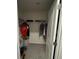 Walk-in closet with shelving, hanging rods, and ample storage space for organizing clothes and accessories at 11517 Timber Grove Ln, Brooksville, FL 34613