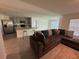 Open-concept living room and kitchen area, great for entertaining at 11517 Timber Grove Ln, Brooksville, FL 34613