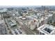 Urban aerial view of a cityscape featuring buildings, streets, and waterfront, showcasing community at 1227 E Madison St # 1004, Tampa, FL 33602