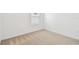 Bedroom with neutral carpet, a window, and ample natural light at 12823 Wanderlust Pl, Parrish, FL 34219