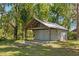 Spacious metal outbuilding with a concrete base, perfect for storage or workshop space at 14206 Walden Sheffield Rd, Dover, FL 33527