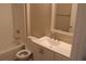 This bathroom has a tub and shower combination, toilet and vanity at 18415 Bridle Club Dr, Tampa, FL 33647