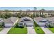 Aerial view of beautiful well-kept homes in a neighborhood with lush lawns at 1848 Sunset Preserve Way, Port Charlotte, FL 33953