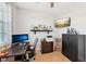 Small office with floating shelf, desk, printer, and cabinet at 1848 Sunset Preserve Way, Port Charlotte, FL 33953