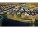 An aerial view highlighting the community's serene lakefront living and beautiful surroundings at 19122 Sunset Bay Dr, Land O Lakes, FL 34638