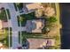An aerial view showing a home situated on a well-maintained lot next to a beautiful pond at 19122 Sunset Bay Dr, Land O Lakes, FL 34638