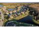 A scenic aerial view of the community, featuring ponds and lush natural surroundings at 19122 Sunset Bay Dr, Land O Lakes, FL 34638