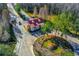 An aerial view of the community entrance showcasing landscaping and water feature at 19122 Sunset Bay Dr, Land O Lakes, FL 34638
