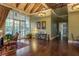 Inviting lobby area with beautiful wood floors, elegant lighting, and comfortable seating, perfect for greeting guests at 19122 Sunset Bay Dr, Land O Lakes, FL 34638