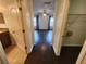 Hallway with bedroom, bath and walk-in closet access at 2807 Lantern Hill Ave, Brandon, FL 33511