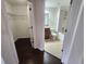 Open doors view from hallway to a bathroom and closet at 2807 Lantern Hill Ave, Brandon, FL 33511