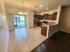 Eat-in kitchen with stainless steel appliances, granite countertops, and tile flooring at 2807 Lantern Hill Ave, Brandon, FL 33511