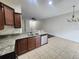 Kitchen featuring granite countertops, stainless steel appliances and tile floor at 2807 Lantern Hill Ave, Brandon, FL 33511