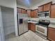 Updated kitchen featuring stainless steel appliances and granite countertops at 2807 Lantern Hill Ave, Brandon, FL 33511
