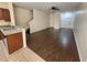 Open-concept living room with luxury flooring, and plenty of natural light at 2807 Lantern Hill Ave, Brandon, FL 33511