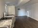Room features a refrigerator, stove and wood look floors at 2912 E North St, Tampa, FL 33610