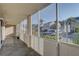 Exterior shot from screened in patio showcasing a neighborhood at 3200 Charter Club Dr # A1, Tarpon Springs, FL 34688