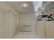 Walk-in closet with shelving and ample storage space at 3200 Charter Club Dr # A1, Tarpon Springs, FL 34688