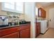 Butler's Pantry features lots of natural light and a coffee bar at 328 Siena Vista Pl, Sun City Center, FL 33573