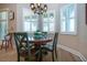 Dining area features a round table and lots of natural light at 328 Siena Vista Pl, Sun City Center, FL 33573