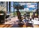 Relaxing screened lanai with comfortable seating and a beautiful outdoor view at 328 Siena Vista Pl, Sun City Center, FL 33573