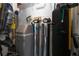 Well-maintained utility room featuring a water filtration system, softener, and storage at 328 Siena Vista Pl, Sun City Center, FL 33573