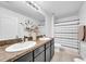 Bathroom features double sinks, granite countertops and a shower with a curtain at 3301 San Moise Pl, Plant City, FL 33567