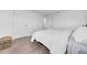 Bedroom with neutral carpet, walk-in closet, and a comfortable bed perfect for rest and relaxation at 3301 San Moise Pl, Plant City, FL 33567