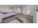 Comfortable bedroom with soft pink walls, plush carpet, and tasteful decorations; ideal for relaxation at 3301 San Moise Pl, Plant City, FL 33567