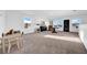 Spacious bonus room with natural light and versatile setup for various activities and furniture arrangements at 3301 San Moise Pl, Plant City, FL 33567