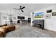 Inviting living space with open floor plan, complemented by sleek flooring and natural light, perfect for relaxation at 3301 San Moise Pl, Plant City, FL 33567
