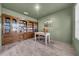 Office with custom built-in bookcase and natural light at 3301 San Moise Pl, Plant City, FL 33567