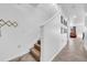 Staircase with carpeted steps and decorative accents at 3301 San Moise Pl, Plant City, FL 33567