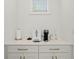 Well-lit coffee bar area features modern countertops and cabinetry at 3618 W Royal Palm Cir, Tampa, FL 33629