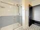 Bathroom with a tiled shower and patterned floor tiles at 4827 7Th N Ave, St Petersburg, FL 33713