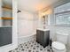 Classic bathroom with subway tile, and patterned tile floors, offering a blend of vintage charm and modern convenience at 4827 7Th N Ave, St Petersburg, FL 33713