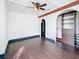 Spacious bedroom with archway details and built-in storage, combining functionality with architectural charm at 4827 7Th N Ave, St Petersburg, FL 33713